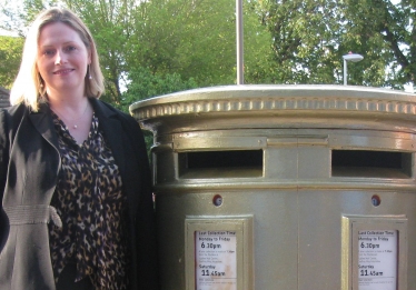 Mary Macleod MP at the Gold Post Box