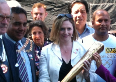 Mary Macleod with the Olympic Torch in Hounslow